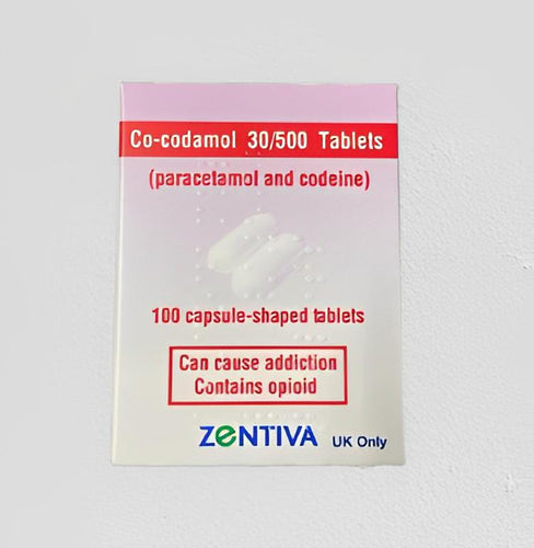 Packaging for Co-Codamol 30/500mg tablets, indicating 100 capsule-shaped tablets, paracetamol and codeine, with a warning about potential addiction.